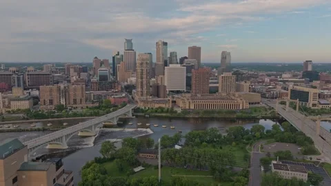 4K Left Rotating Drone Shot of Minneapolis Skyline Overlooking Mississippi River Stock Footage 283339274
