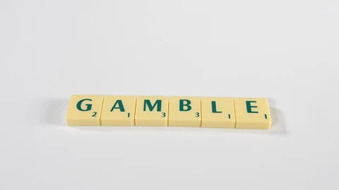 4K Letters from spelling out Gamble word, Spelled with educational blocks Stock Footage 90792172