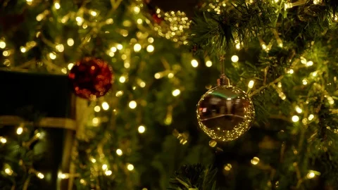 4K: Light decorations during Happy New Year at night. There are gift boxes, ball Stock Footage 120711064