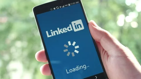 4K Linkedin app on Smartphone Loading Screen - Social Media Stock Footage 65521607