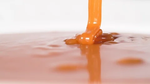 4K - Liquid caramel candy. Close-up Stock Footage 120484450