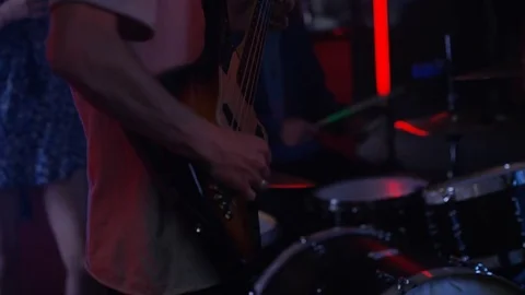 4K Live band performing for young nightclub crowd Stock Footage