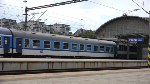 4K Local train arrive in central station famous Prague cityscape people travel Stock Footage 72192683