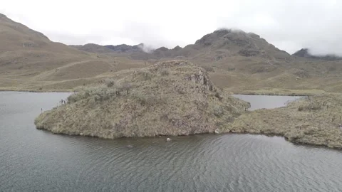 4K Log Drone Approaching Island in Lake in Mountains Cuenca Ecuador Stock Footage 277211148