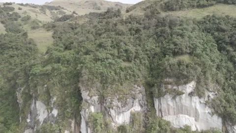 4K Log Drone Approaching White Cliff on Green Mountain Cuenca Ecuador Stock Footage 271372580