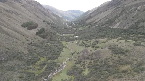 4K Log Drone Flying Over River in Green Valley Cuenca Ecuador Stock Footage 277211150