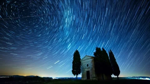 4K Long-Exposure Star Trails Over Stone Chapel and Cypress Trees Stock Footage 330480091