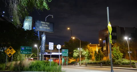 4K LONG SHOT HYPER TIMELAPSE OF CITY STREET WITH MULTIPLE SIGNS AND CARS Stock Footage 132081186