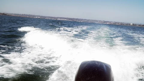4k. Looking Back from Speedboat. Motor Creates Waves on the Ocean Surface. 스톡 동영상 90730332