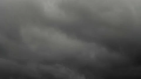4K Loop of clouds over black sky time lapse Stock Footage 133451295