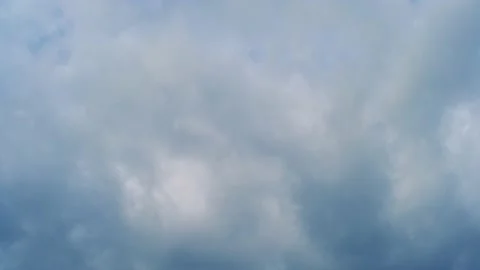 4K Loop of white clouds over blue sky time lapse Stock Footage 133500984