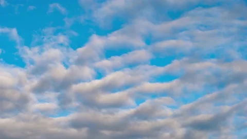 4K Loop of white clouds over sky time lapse Stock Footage 134490732