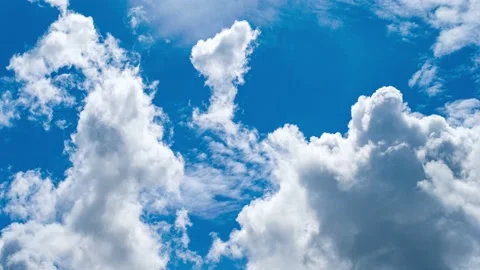 4K Loop of white clouds over sky time lapse Stock Footage 135689378