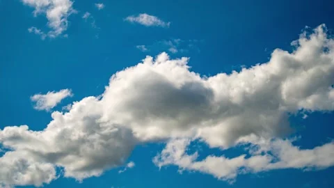 4K Loop of white clouds over sky time lapse Stock Footage 154123299