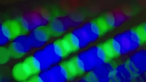 4K looped moving multicoloured glitter lights, defocused light reflections. Stock Footage 328143032
