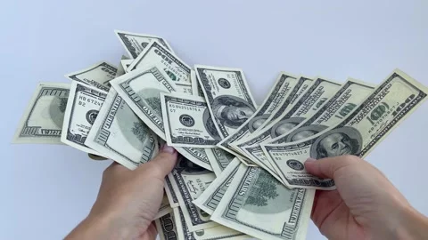 4k A lot of dollars fall through hands. Concept of loosing money. Video stock 161252633