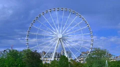 4K low angle footage of a time-lapse Ferris wheel in Paris. Stock Footage 163444751