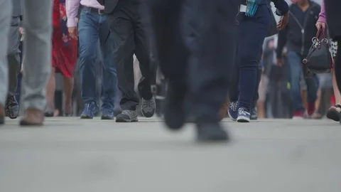 4K Low angle view, the feet of city workers and tourists walking through London Stock Footage 71075262