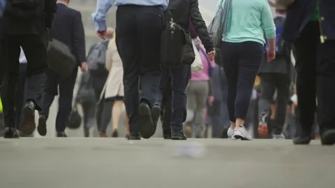4K Low angle view, the feet of city workers and tourists walking through London Stock Footage 71075574