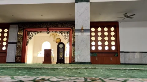 4K Low Angle View of Mosque Interior with Green Floor and Wooden Calligraphy Video stock 280125331