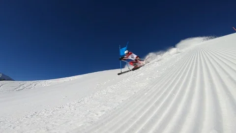 4K low angle view professional giant slalom skier during training on ski piste Video stock 115970031