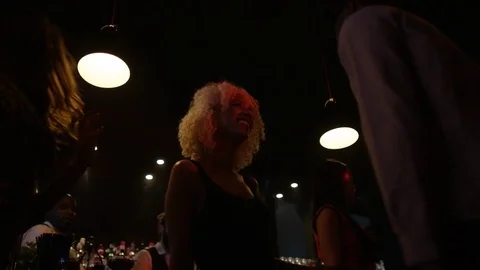 4K Low Angle View Of Young Party Crowd Dancing &amp; Having Fun In Nightclub Video stock 75654475