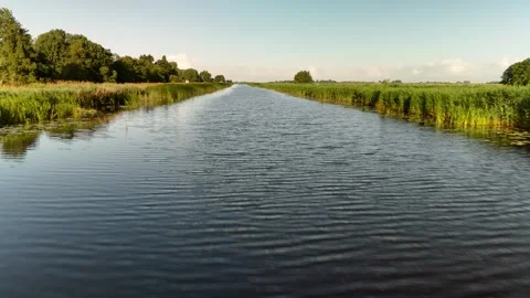 4K Low Drone Flight Over Dutch Canal Summer Clear Sky Aerial Видео 317401739