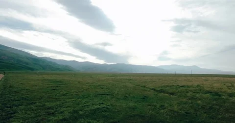 4k Low flying Over Dirt Road into California Mountains with LUT Stock Footage 74113200