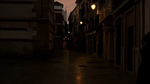 4k low light static shot of a narrow pedestrian street in the early morning Stock Footage 123664663