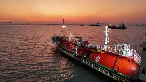 4K LPG tanker ship floating on sea surface during golden sunset Stock Footage 330402518