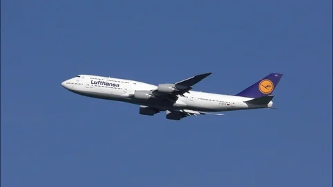 4K Lufthansa Airlines Boeing 747 jumbo jet taking off, engine sound, blue sky Stock Footage 91520292