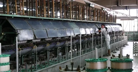 4k Machine Producing Tissues In A Silk Factory,Spinning Machine Collect silk. Stock Footage 46204421