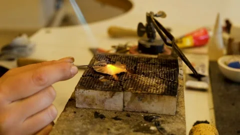 4K Macro Close Up Melting and Shaping Gold Jewelry with Torch Stock Footage 327863418