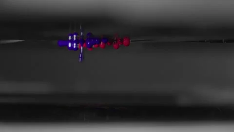 4K macro footage of red and blue ink drops falling Stock Footage 328323866