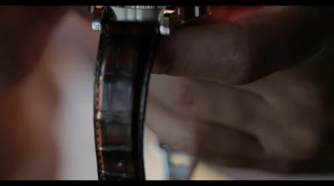 4k Macro of man looking at watch with loupe Video stock 40273609