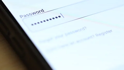 4K macro shot of a security password field on a smartphone being filled with hid Stock Footage 342777999