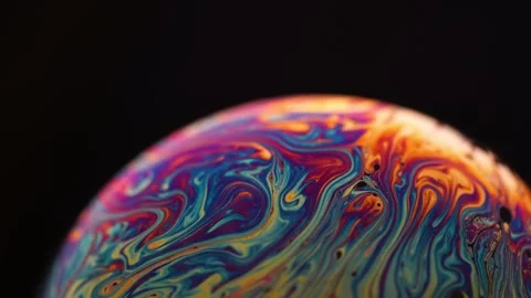 4K Macro Shot Soap Bubble Swirling Iridescent Colors Light Interference Stock-Footage 334441121