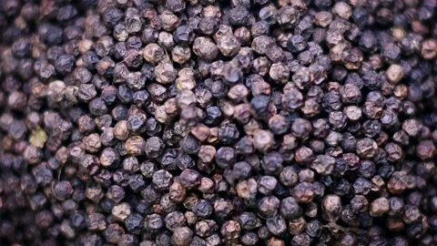 4K Macro Texture Pile of Whole Black Peppercorns Fill Frame Stock Footage 336935861