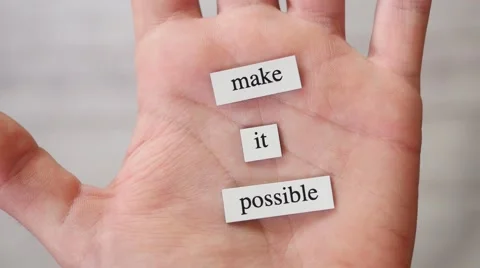 4K MAKE IT POSSIBLE Words In Opening Hand Stock Footage 56704788