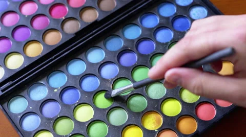 4K Makeup eye shadow palette in many different colors, brush brushing Stock Footage 50625774