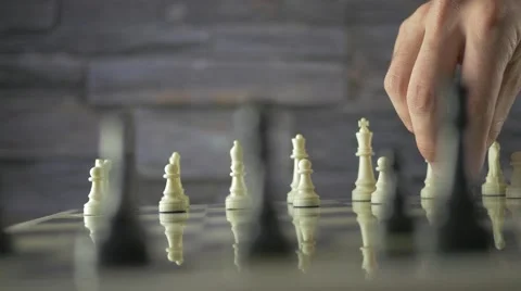 Man thinking about next chess move gets checkmate - Free Stock Video