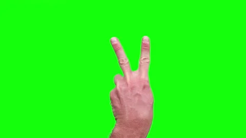 4K male hands making WIN sign gesture isolated on green screen chromakey Stock Footage 135025273