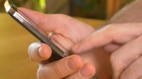 4k male using iphone smartphone tracking shot typing writing technology online Stock Footage 57310987