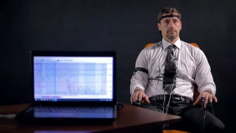 4K. Man connected to the lie detector circuit. Stock Footage 77123088