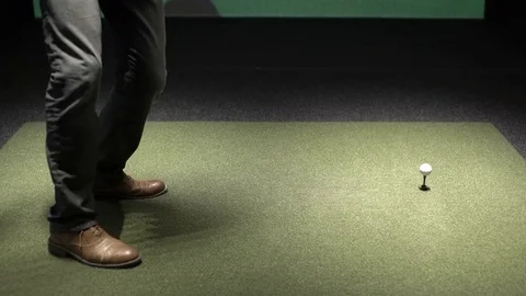 4K man drives golf ball into simulator and hits the rough Stock Footage 71947853