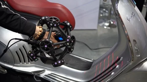 4K Man hand scanning a motorcycle using a portable machine 3D scan precision-Dan Vidéo 120183633