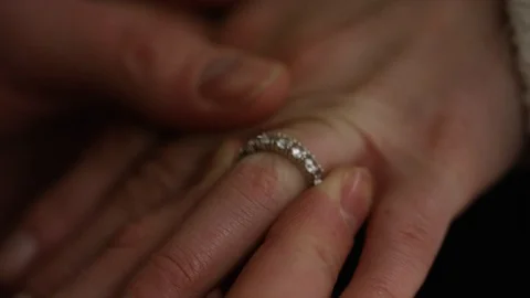 4K Man puts engagement ring on female's finger Video stock 73845663