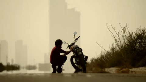 4K Man Riding Motorcycle Stock Footage 141669715