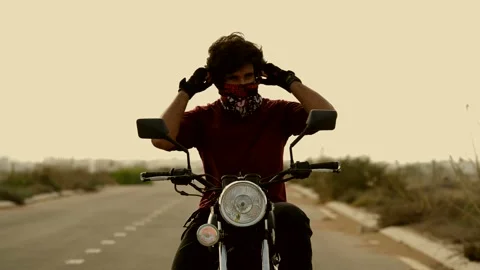 4K Man Riding Motorcycle Stock Footage 141669894