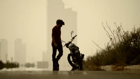 4K Man Riding Motorcycle Stock Footage 141670084